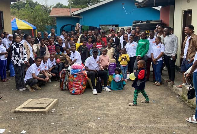 Winter Trails Tours and Safaris team distributing supplies to children