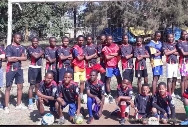 Young football players at a local club in Moshi supported by Winter Trails Tours and Safaris